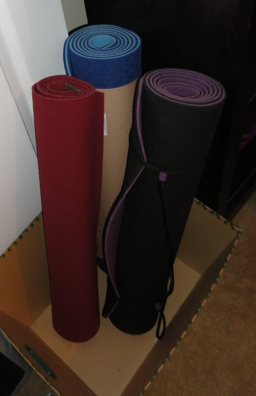 3 more yoga mats in the bedroom